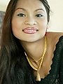 Thai goddess Tailynn lifts her black micro skirt and exposes her tight ass