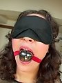 Gagged and blindfolded curly haired teen gets double penetrated
